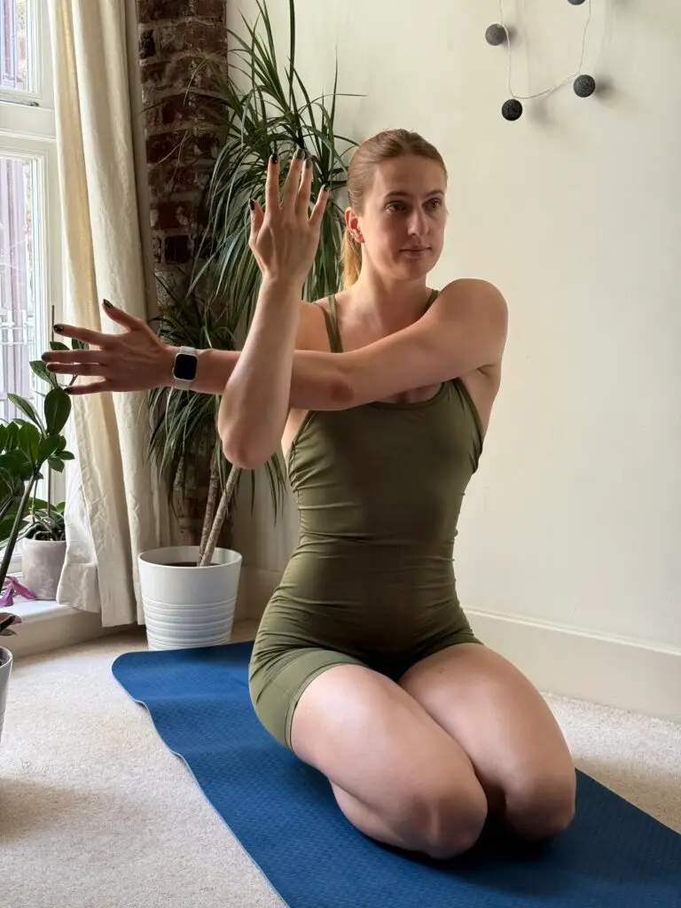 Strength Training Stretches: crossover shoulder strech- The World’s 10 Most Significant Stretches You Should Be Doing After Your Session - 12reps app - strength training app